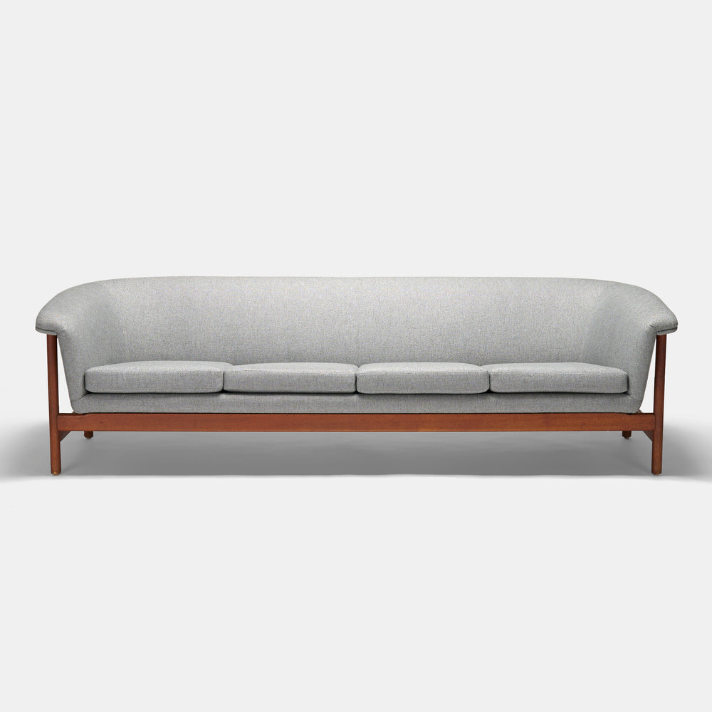 Professionally reupholstered sculptural four seat sofa by Westnofa, Norway circa 1965.