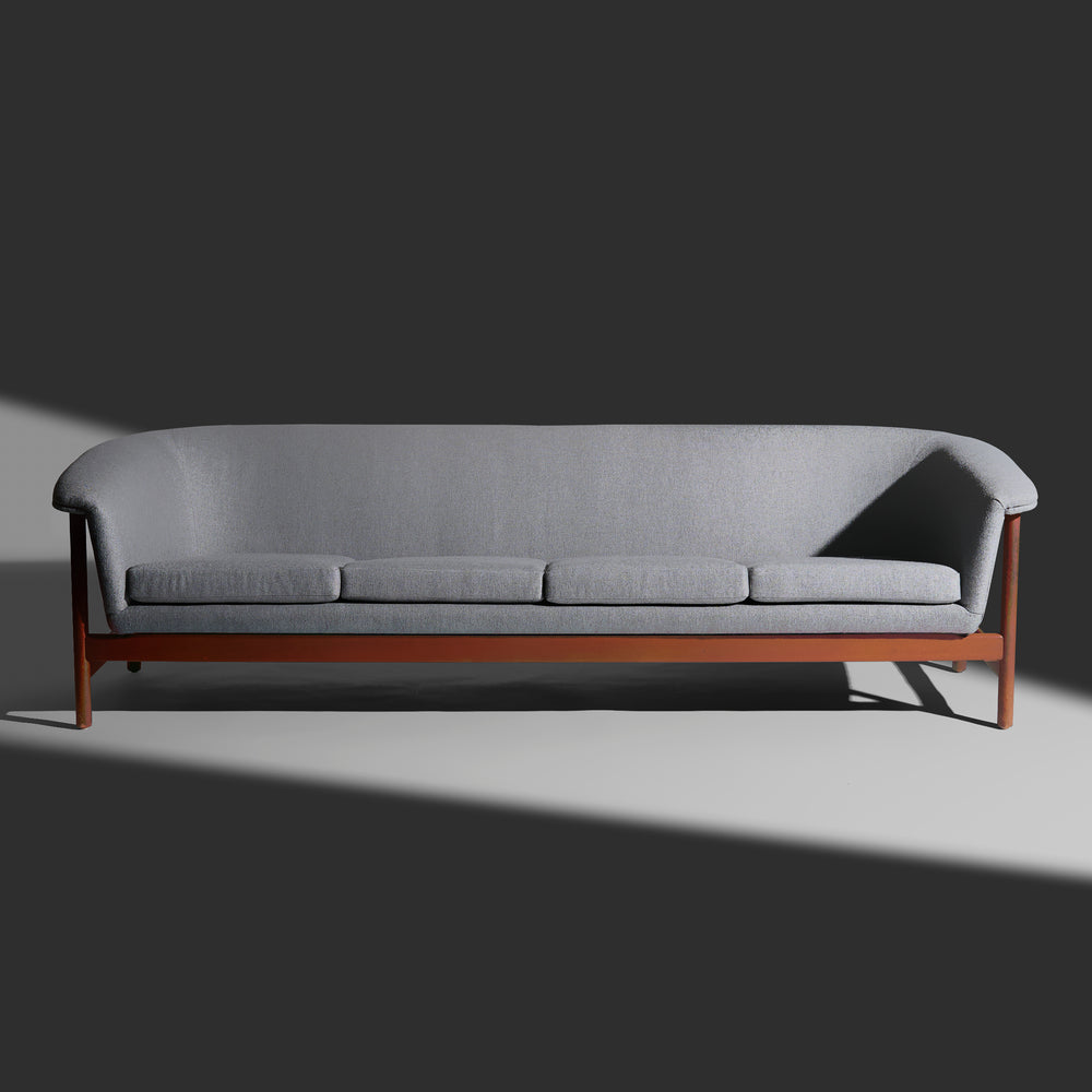 Professionally reupholstered sculptural four seat sofa by Westnofa, Norway circa 1965.