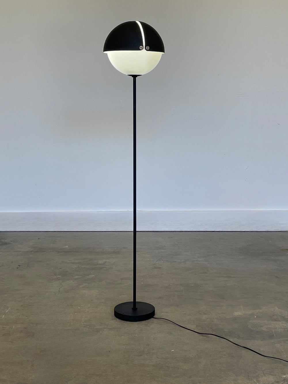 Attributed to Stinovo black and chrome orb floor lamp