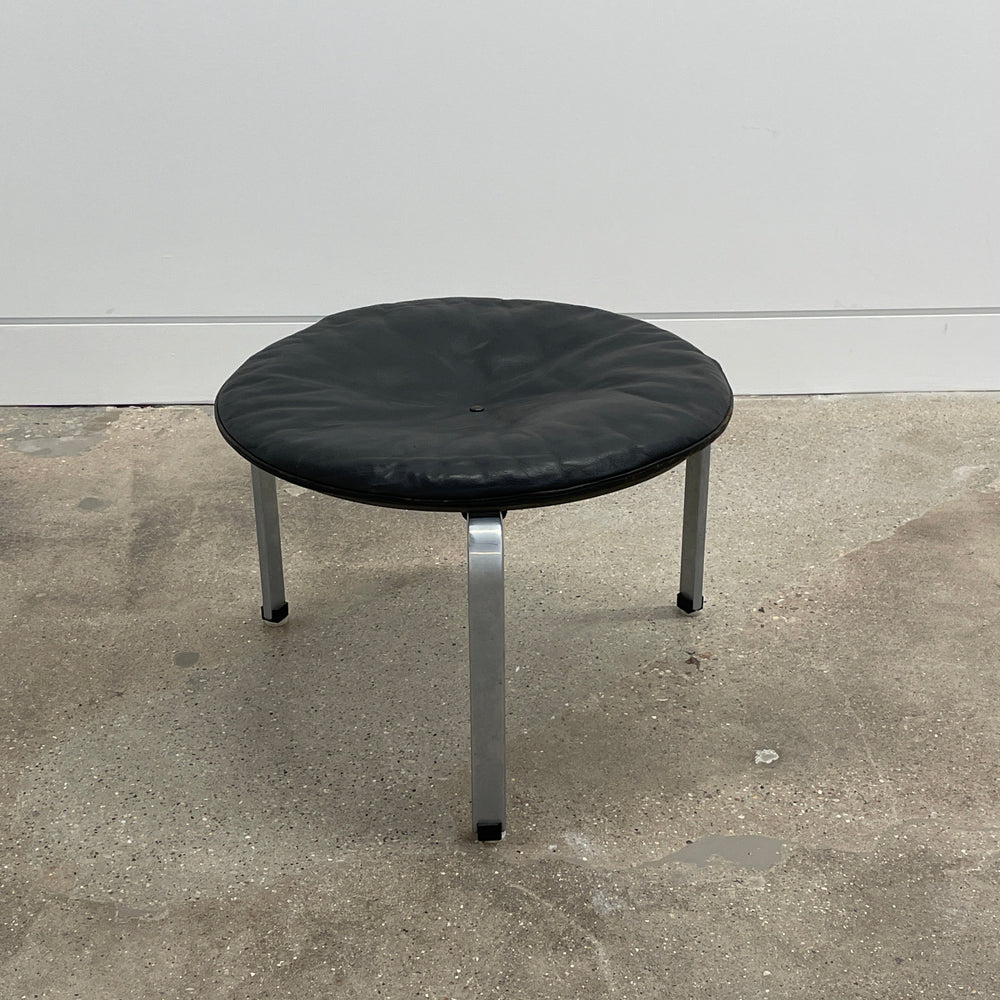 Poul Kjaerholm model "PK 33" black leather stool produced by E. Kold Christensen